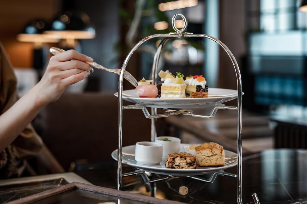 Sheraton Grand Hiroshima Hotel Exterior photo Afternoon tea at the Conrad Hong Kong